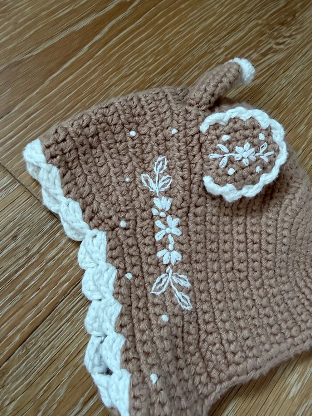 Anthropologie Crocheted Earflap Hat in Tan and White Trim